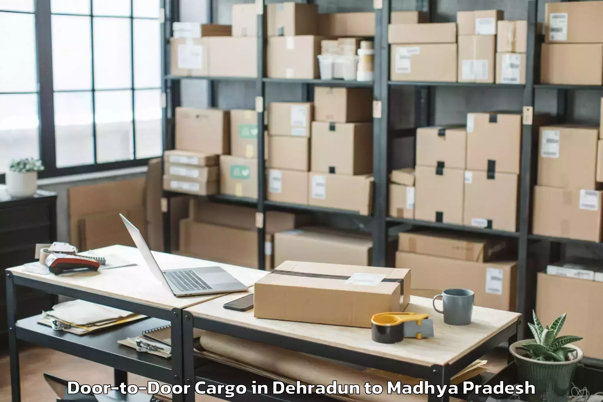 Professional Dehradun to Dabra Door To Door Cargo